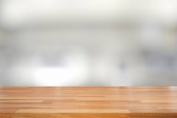 istock Empty wooden table and interior background, product display, blurred light interior background with bokeh 1065666668