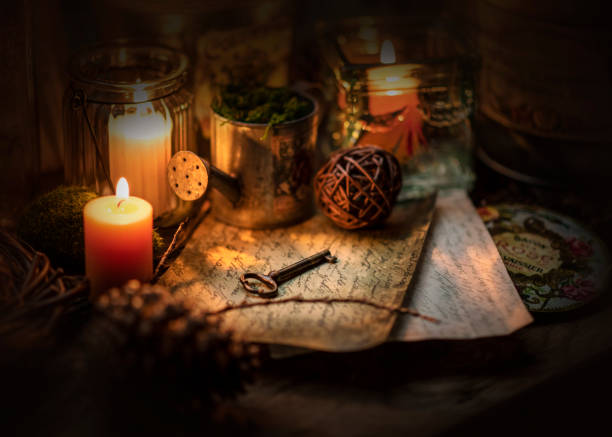 istock Old coins, key, burning candle and vintage letters 1065678922