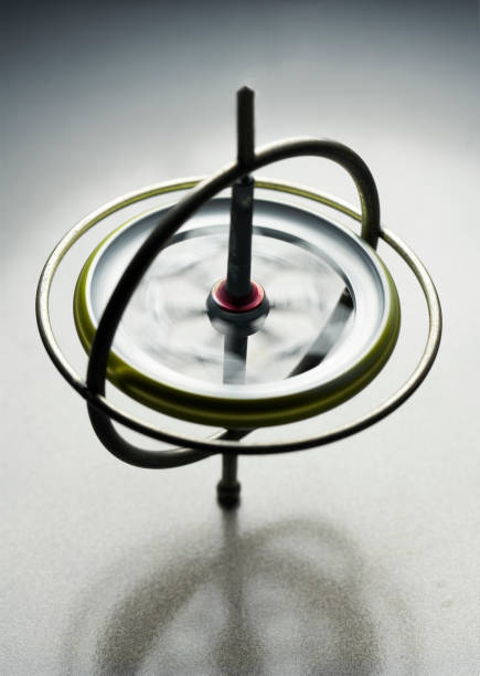 istock Gyroscope toy that is spinning keeping balance for spin concept 1065680594