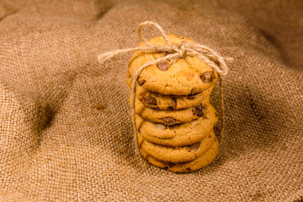 istock Stack of the chocolate chip cookies on sackcloth 1065683964
