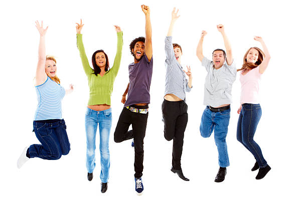 istock group of young people jumping over white 106569195