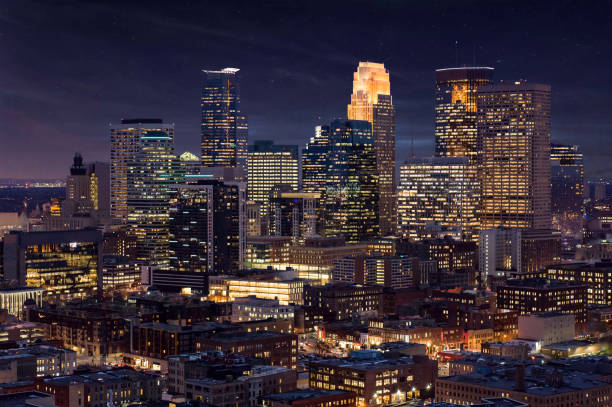 Minneapolis Skyline by Night Minneapolis Skyline at Night - Aerial minneapolis stock pictures, royalty-free photos & images