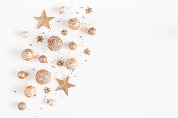 istock Christmas composition. Christmas golden decorations on white background. Flat lay, top view, copy space 1065696950