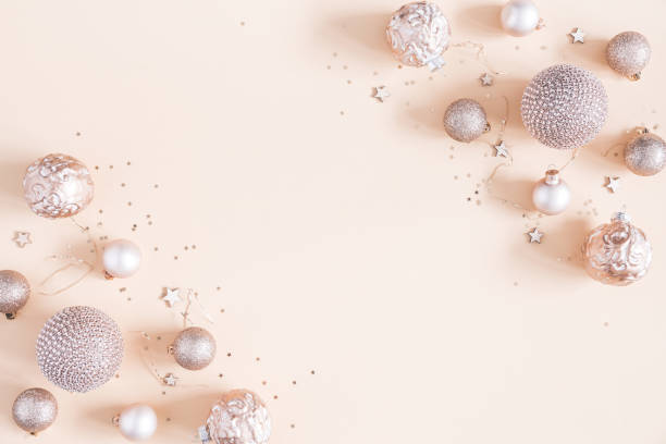 istock Christmas composition. Christmas decorations on pastel beige background. Flat lay, top view, copy space 1065696976
