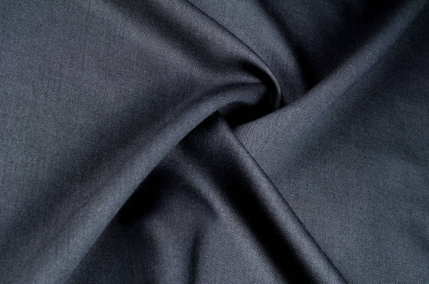 istock Background texture, pattern. cloth wool suit gray. A genuine flannel is always made of carded yarn, carded flannel is ideal in the cold months of the year, it is heavy, cozy and soft. 1065697670