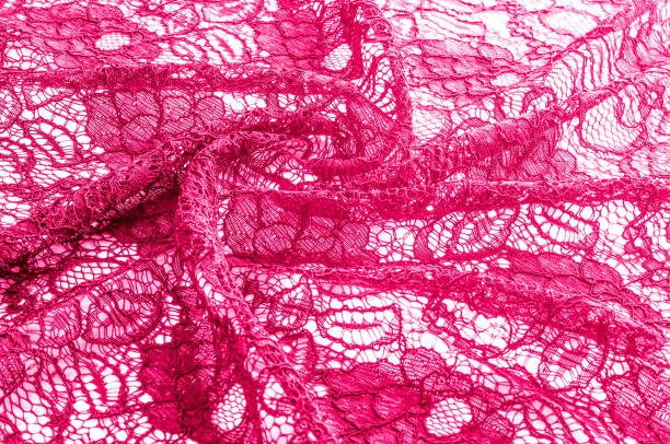 istock Texture, background, pattern. Cloth red lace. Background of fabric from lace stylized roses. Abstract lace pattern with flowers. Wallpaper, underwear and jewelry. Your invitations 1065697672