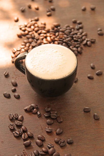 istock freshly ground morning coffee in a cup with coffee beans 1065700570
