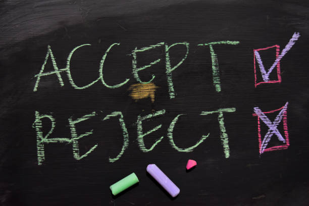 istock Accept or Reject written with color chalk concept on the blackboard 1065700870