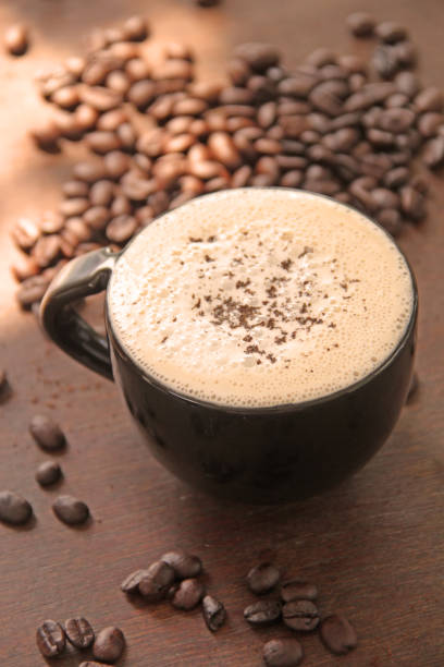 istock freshly ground morning coffee in a cup with coffee beans 1065706760