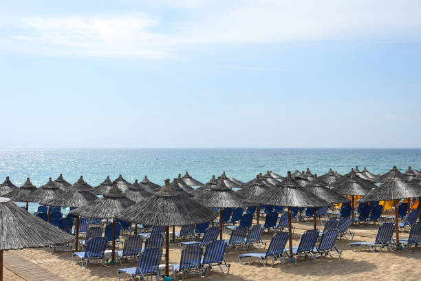 istock Beach umbrellas and sunbeds on Greece 1065707394