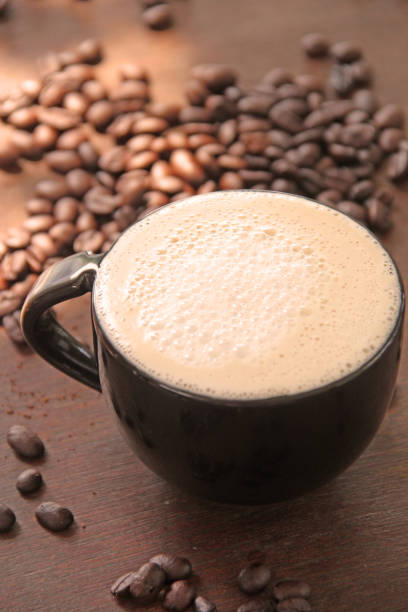 istock freshly ground morning coffee in a cup with coffee beans 1065711038