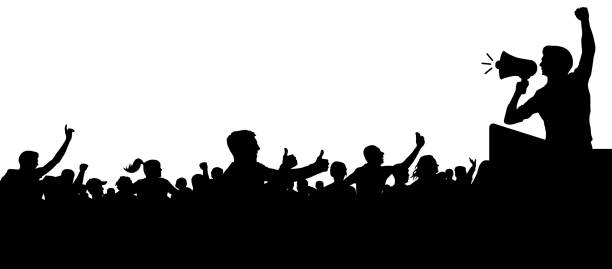 Crowd of people silhouette vector. Anonymous heads. Speaker, loudspeaker, orator, spokesman. Applause of a cheerful people mob. Sports fans. Demonstration, protest. Meeting of people Crowd of people silhouette vector. Anonymous heads. Speaker, loudspeaker, orator, spokesman. Applause of a cheerful people mob. Sports fans. Demonstration, protest. Meeting of people megaphone silhouettes stock illustrations