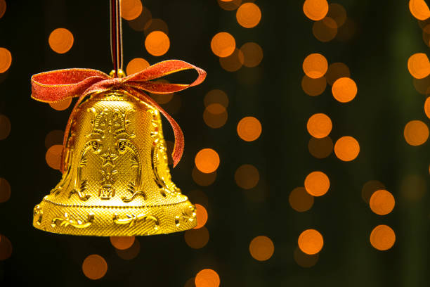 istock christmas bell on the bokeh background. 1065722194