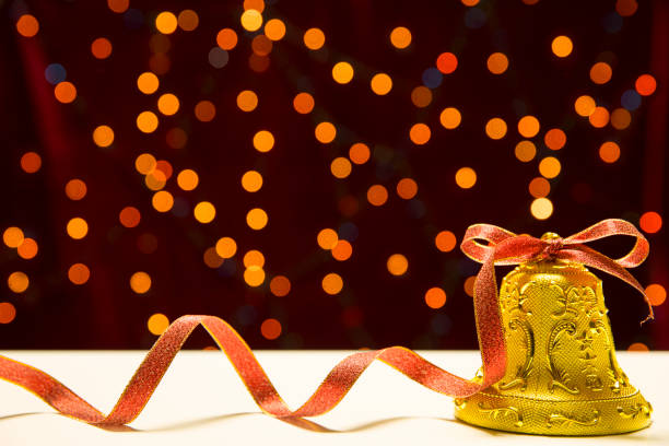 istock merry christmas and happy new year concept_bell and light. 1065723046