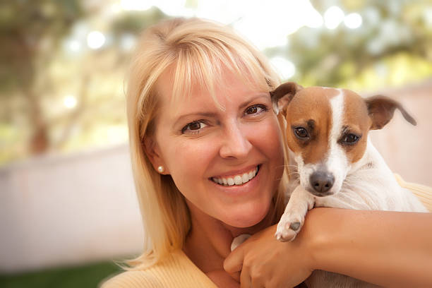 istock Attractive Woman and Her Jack Russell Terrier Dog 106572610