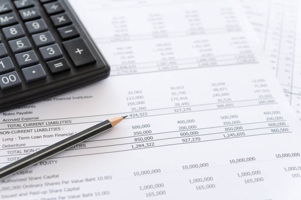 accounting spread sheets - tax financial figures analyzing banking document imagens e fotografias de stock