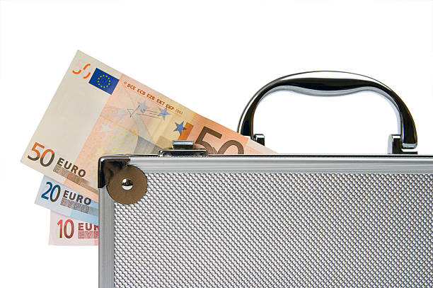 istock Euro cash in silver suitcase isolated 106573410