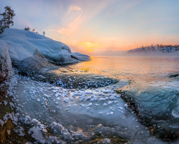 istock Winter rocky bay on the lake. 1065736546