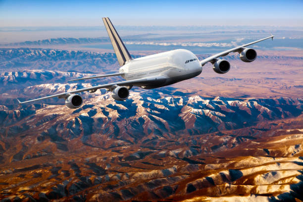 istock Passenger aircraft in flight. Front view of aircraft. 1065736642