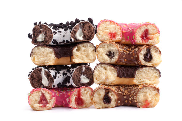 Broken halves of donuts on white background isolated