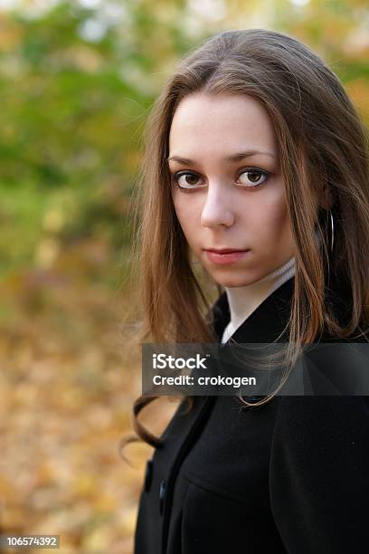 Sad Pretty Girl In Fall Park Stock Photo - Download Image Now - Adult, Autumn, Beautiful People