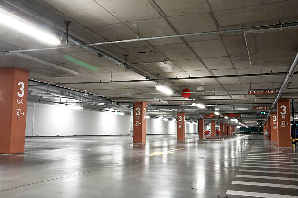istock Underground parking lot with orange pillars 106575111