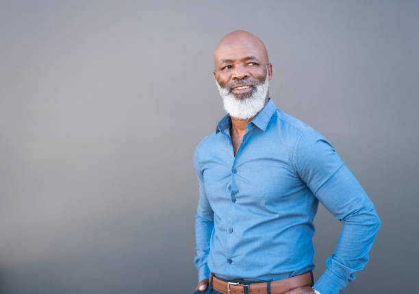 istock African American men looking away with hands in pockets 1065763796