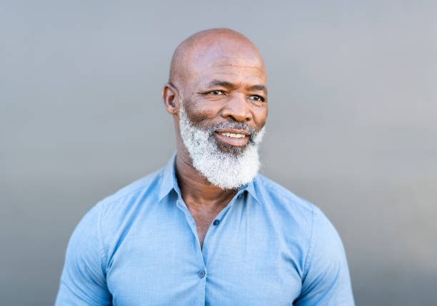 istock African American male looking away with hands in pockets 1065763928