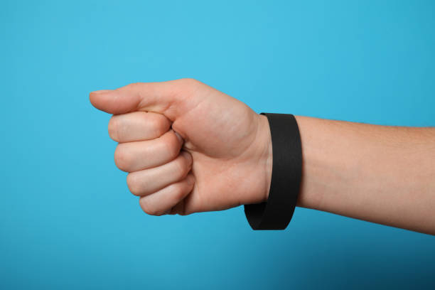 istock Accessory paper wristband mockup, event (hospital) bracelet. Black empty ticket template 1065766562