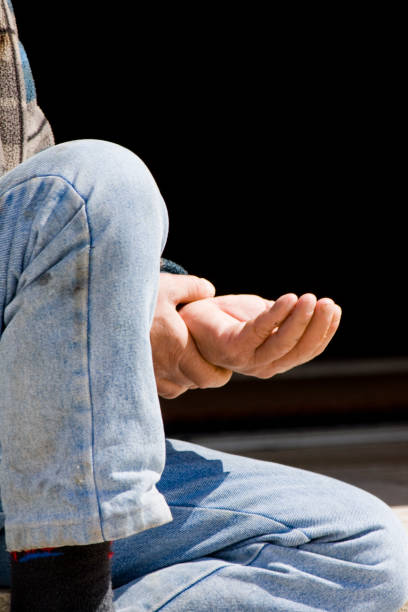 istock Homeless person reaching out hand 1065766932