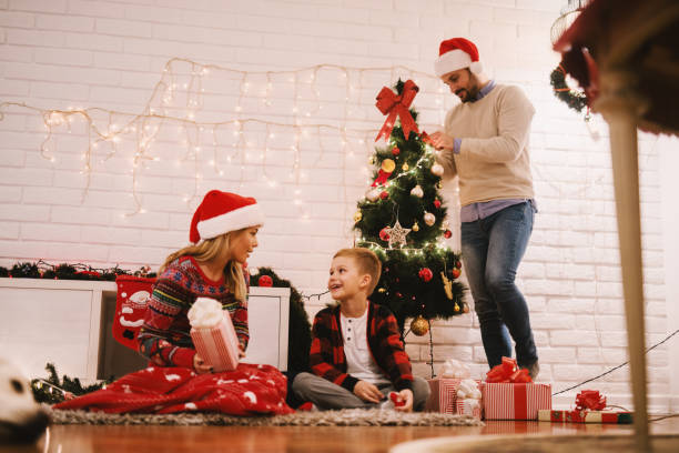 istock Happy family christmas eve. 1065767878