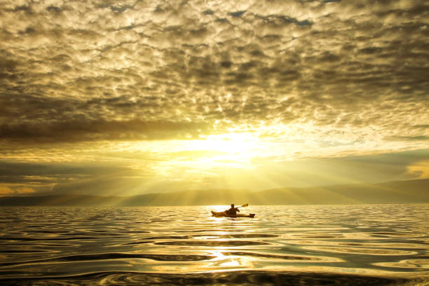 istock A man in a sea kayak on Lake Baikal 1065767906