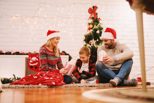 istock Happy family christmas eve. 1065768338