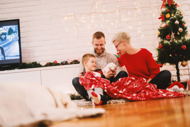 istock Happy family christmas eve. 1065770356