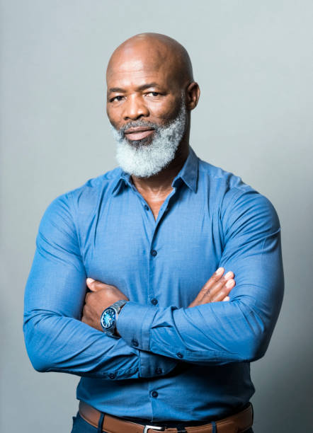 istock Confident CEO with arms crossed. 1065770552