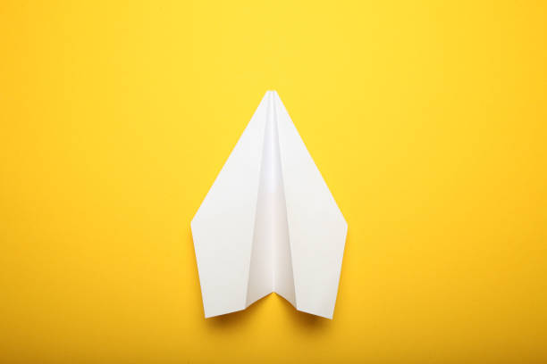 istock White origami aircraft, isolated paper plane 1065770840