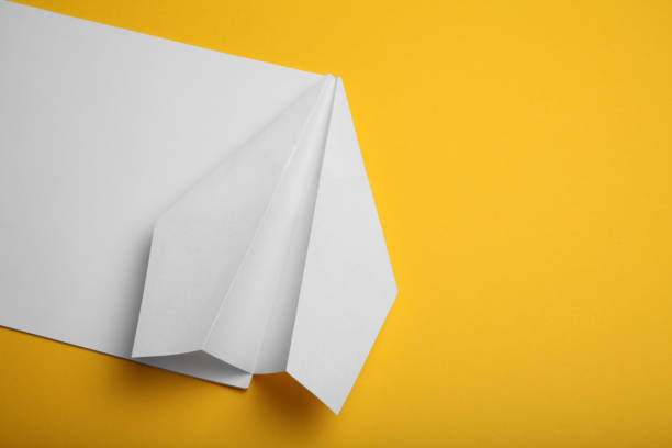 istock Attractive aviation background, bright paper plane 1065770996