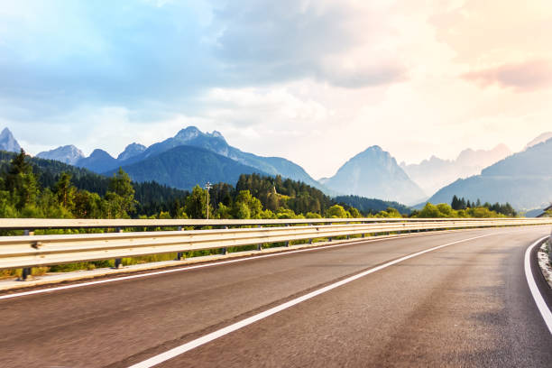 istock Upland road in the Austrian Mountains, summer view 1065774892
