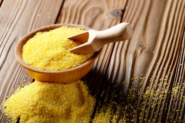 istock Scoop in Bowl of corn grits on kitchen table 1065775666