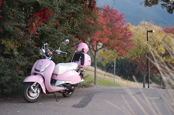 istock pink scooter and helmet 106577583