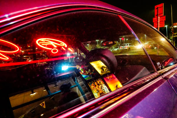 Stockholm, Sweden November 10, 2018 The SF movie house reflected in the wndow of a parked car on Lidingo island.
