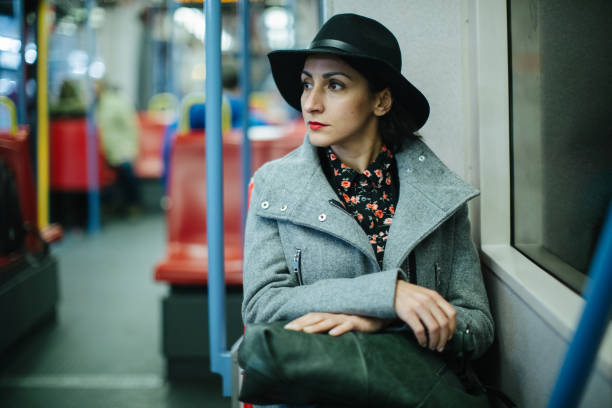 istock Woman in public transportation 1065781616