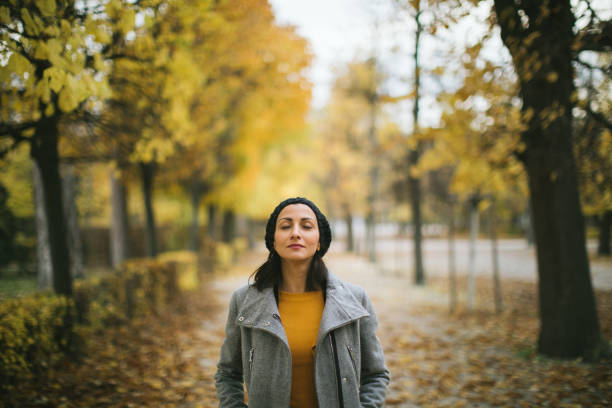 i love autumn - coat warm clothing one person joy imagens e fotografias de stock