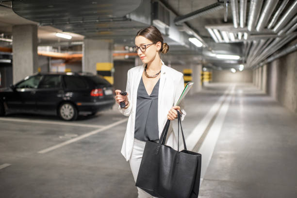 istock Woman in the underground car parking 1065782032