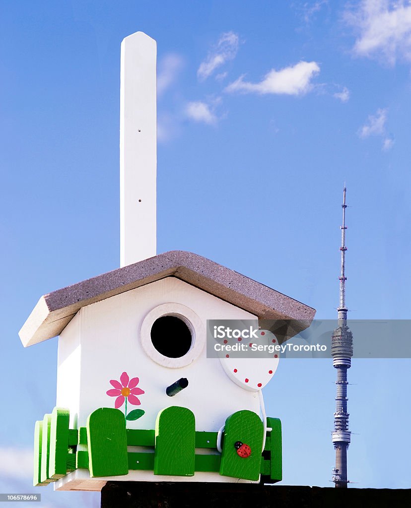 Hand made creative nestling box on sky blue background  Animal Stock Photo