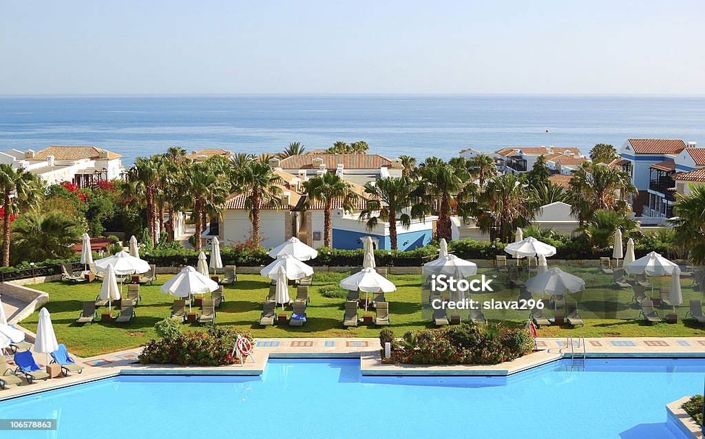 Swimming pool at the modern luxury hotel, Crete, Greece  Aegean Sea Stock Photo