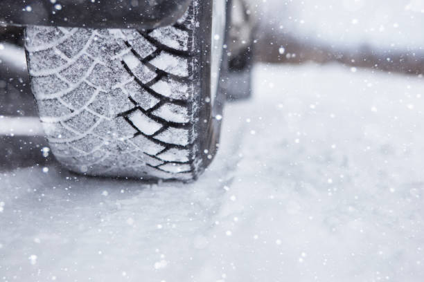 istock Car is on a snow-covered winter road 1065789906