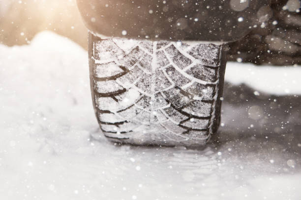 istock Car is on a snow-covered winter road 1065789982