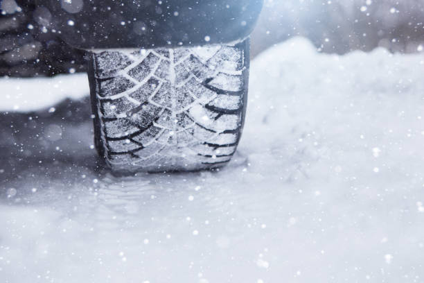 istock Car is on a snow-covered winter road 1065790018