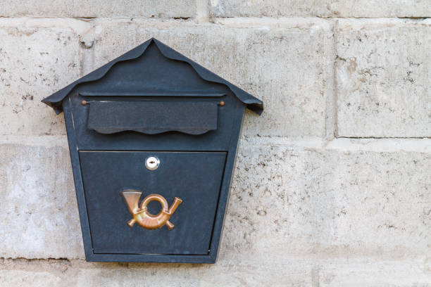 istock A beautiful mailbox hangs waiting for newspapers, parcels and letters. 1065792688
